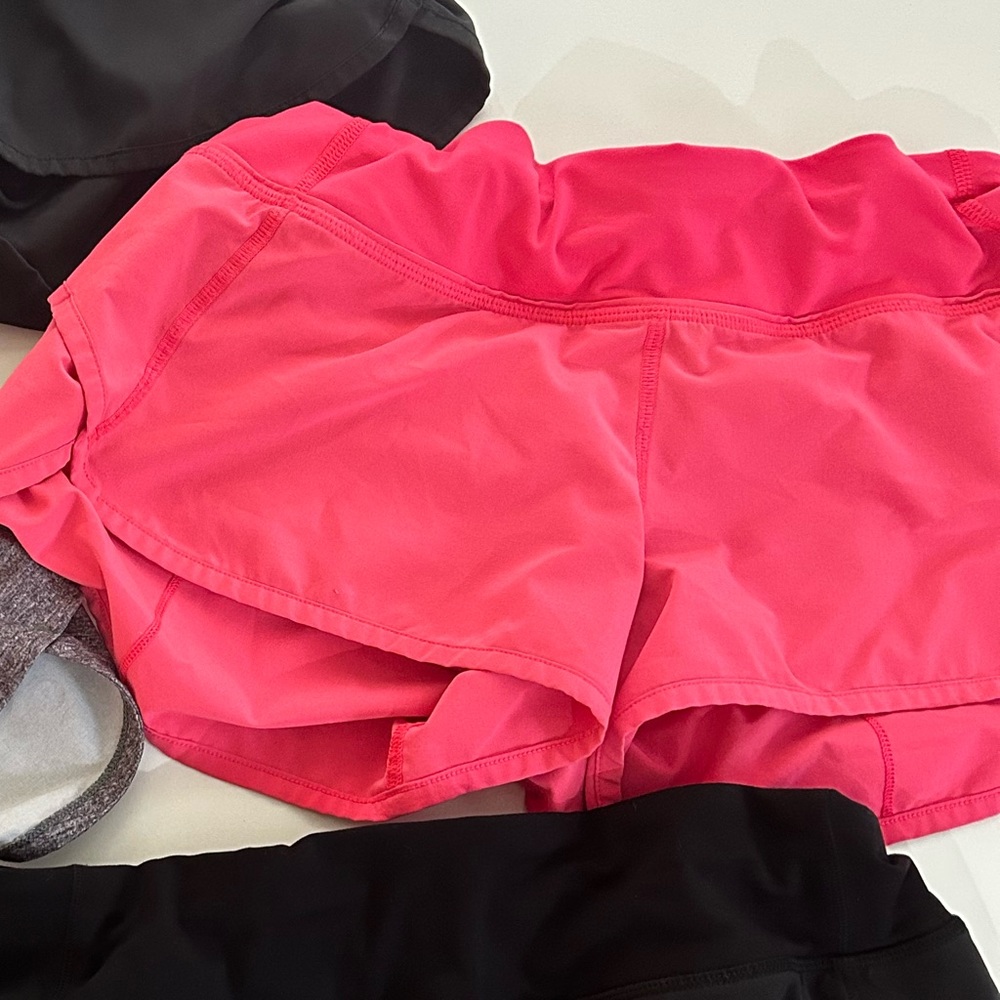Lululemon size 4 bright pink speed up shorts